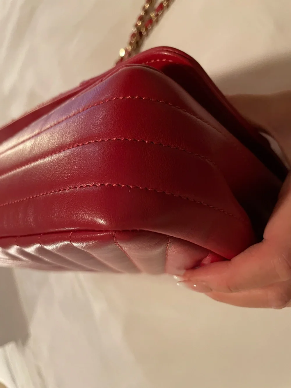 CHANEL Red Quilted Chevron Shoulder Bag with Gold CC Lock